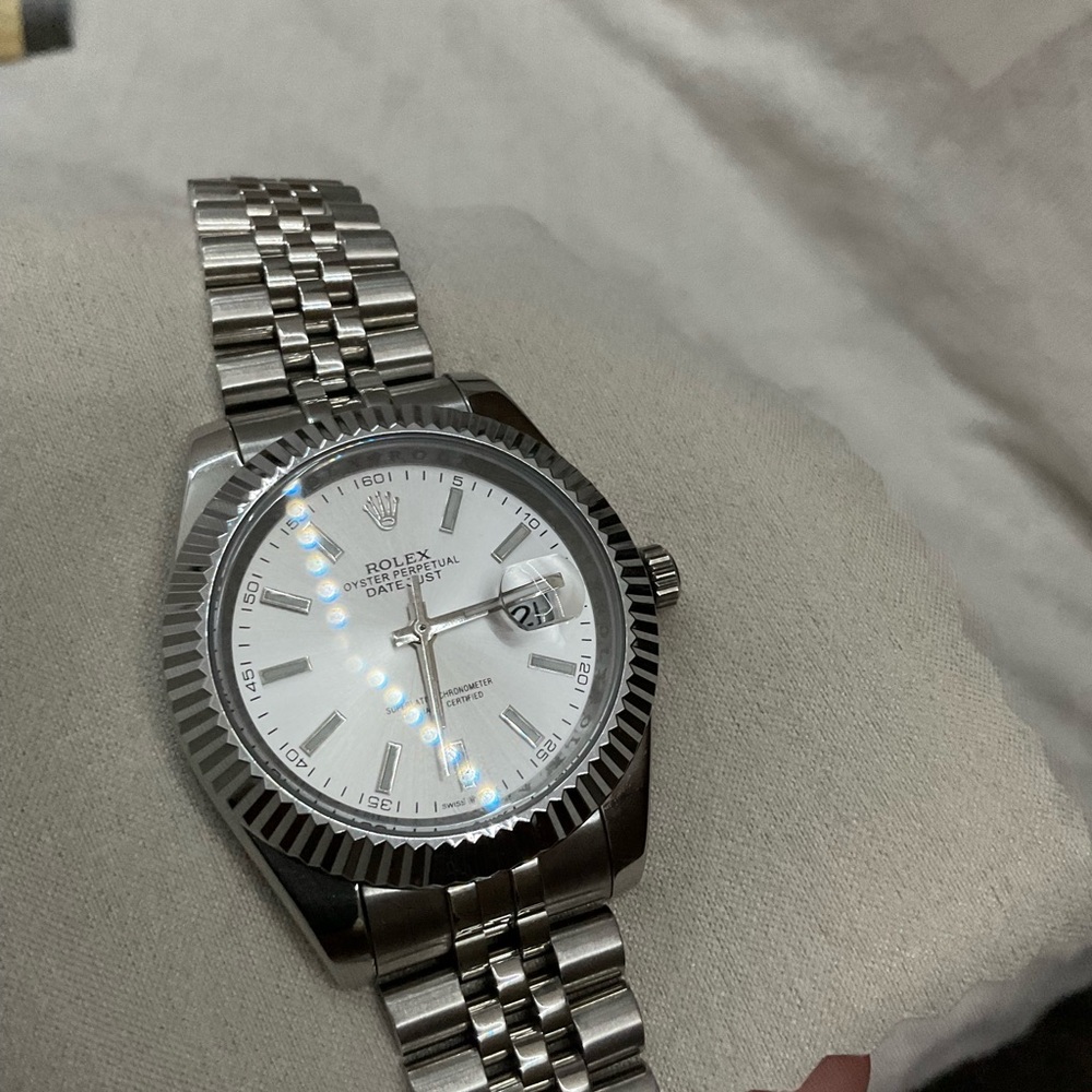 Rolex Silver Timepiece with White Face (negotiable) 2023